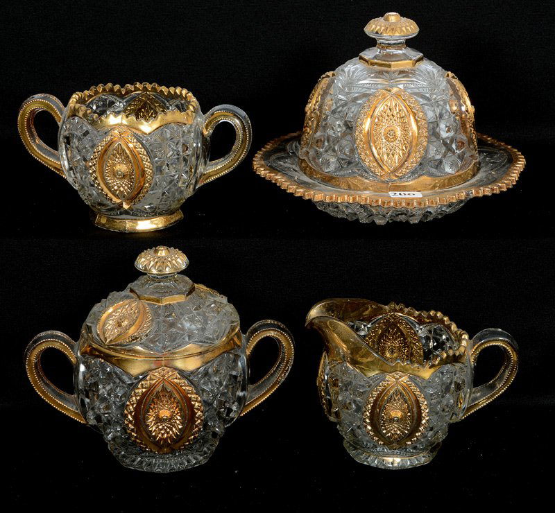 FOUR PIECE CRYSTAL MEMPHIS PATTERN GLASS TABLE SET BY (1 of 3)