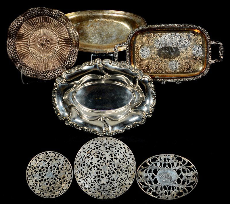 (7) ASSORTED SILVER AND SILVERPLATE ITEMS: (7) ASSORTED SILVER AND SILVERPLATE ITEMS 10" BASKETWEAVE BOWL, UNMARKED - (3) STERLING OVER GLASS TRIVETS - 14" OVAL SILVERPLATE DISH - 13" MERIDEN HAMMERED CELERY TRAY - 14 3/4" CRESCENT SERVICE TRA