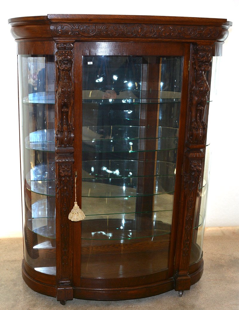 ELABORATE 69" X 54" CARVED OAK BOW FRONT CHINA CABINET