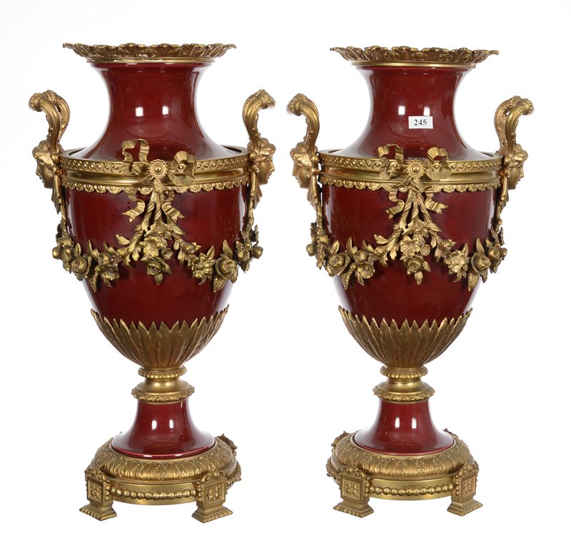 PAIR 19 1/2" UNMARKED FRENCH PEDESTAL URNS: PAIR 19 1/2" UNMARKED FRENCH PEDESTAL URNS MAROON ENAMEL METAL BODY WITH ELABORATE GILT ORMOLU FITTINGS