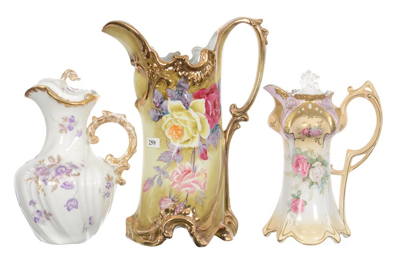 (3) ASSORTED ITEMS: (3) ASSORTED ITEMS (1) 12" TANKARD WITH FAKE NIPPON MARK, GREEN TONES WITH ROSE DECOR - (1) 9" R.S.PRUSSIA POINT AND CLOVER MOLD CHOCOLATE POT (WRONG LID) - (1) LIMOGES CHOCOLATE POT, WHITE WITH LAVEN