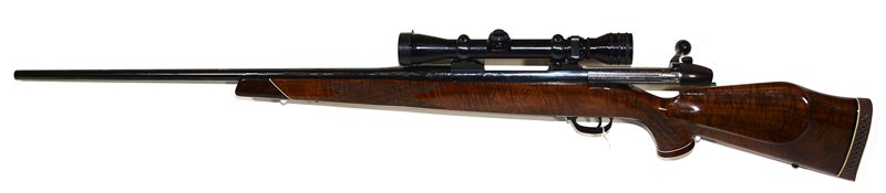 WEATHERBY MARK V .300 MAGNUM BOLT ACTION RIFLE: WEATHERBY MARK V .300 MAGNUM BOLT ACTION RIFLE REDFIELD 2X BY 7X SCOPE - NICE BURL STOCK - MADE IN GERMANY - GOOD BLUING - OVERALL LENGTH IS 44" - BARREL LENGTH IS 24" - FFL TRANSFER REQUIRED - MUST B