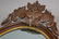 49" X 25" OVAL HANGING WALNUT MIRROR WITH CARVED FRUIT - 2