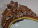 49" X 25" OVAL HANGING WALNUT MIRROR WITH CARVED FRUIT - 3