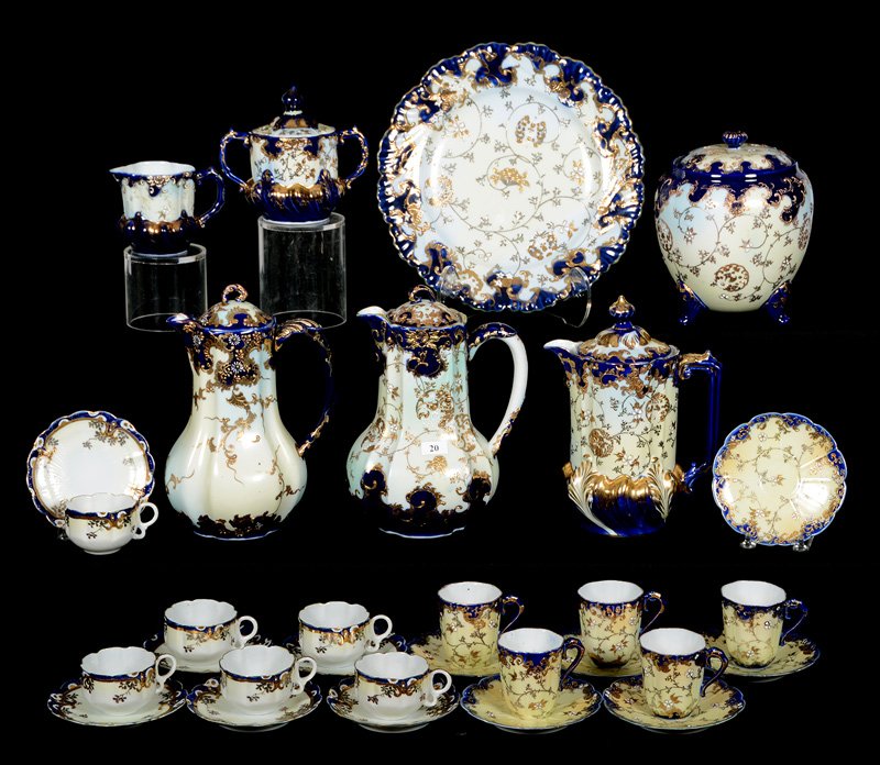 (24) UNMARKED NIPPON ITEMS INCLUDING: (24) UNMARKED NIPPON ITEMS INCLUDING - CHOCOLATE POT WITH (6) CUPS AND SAUCERS - CHOCOLATE POT WITH (5) CUPS AND SAUCERS - CHOCOLATE POT WITH MATCHING CREAMER AND SUGAR - CRACKER JAR AND 11" PLATE - S