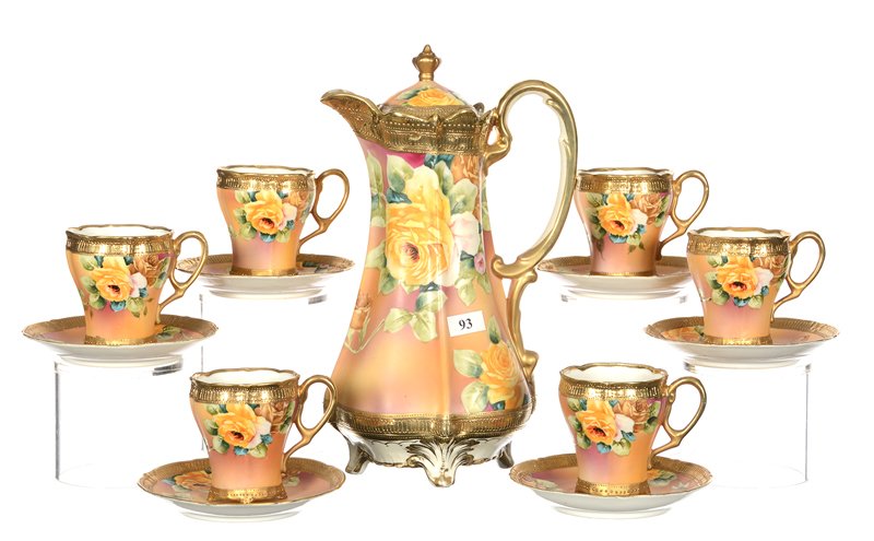 MARKED NIPPON CHOCOLATE SET: 11" MARKED NIPPON CHOCOLATE POT & (6) MATCHING CUPS AND SAUCERS - ORANGE AND PINK TONES WITH YELLOW ROSE DECOR AND GOLD TRIM HIGHLIGHTS