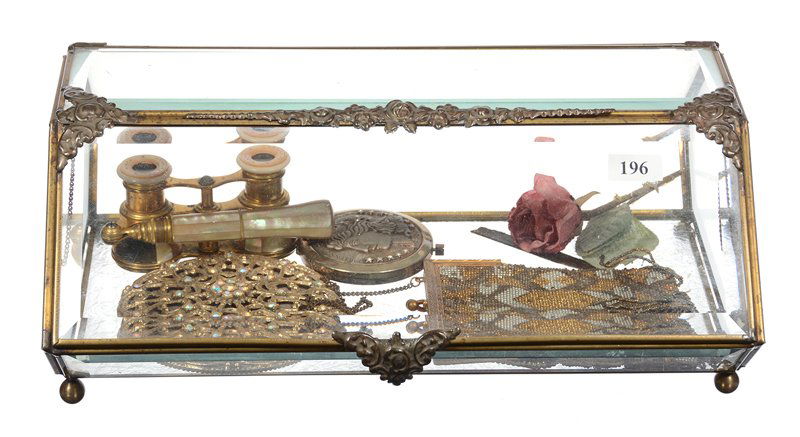 5.5" X 13" BEVELED GLASS JEWELRY DISPLAY CASKET: 5.5" X 13" BEVELED GLASS SIX-SIDED JEWELRY DISPLAY CASKET - ALSO INCLUDES - (6) ASSORTED ITEMS INCLUDING A JEWELED HAND MIRROR, OPERA GLASSES WITH PEARL PANELS (3 PANELS MISSING), 5" BEADED EVENING BA