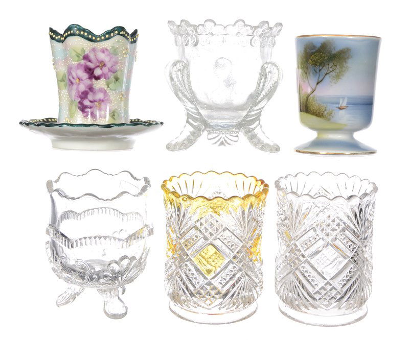 (6) CHINA AND ART GLASS TOOTHPICK HOLDERS: (6) CHINA AND ART GLASS TOOTHPICK HOLDERS - (1) CLEAR WREATH AND SHELL - (1) CLEAR VERMONT PATTERN - (1) CLEAR TACOMA - (1) CLEAR AND YELLOW TACOMA - (1) UNMARKED NIPPON TAPESTRY - (1) UNMARKED PEDEST