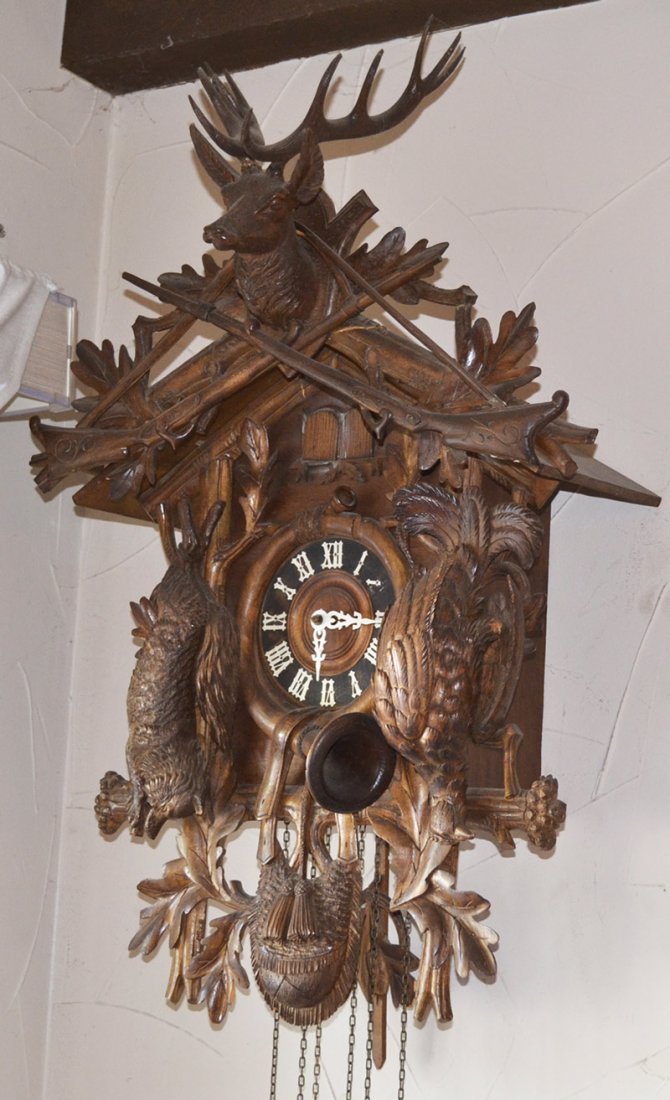 30" X 20" GERMAN BLACK FOREST CUCKOO CLOCK: 30" X 20" GERMAN BLACK FOREST CUCKOO CLOCK - LARGE ELK HEAD WITH RIFLES, GAME BIRD AND MUCH MORE. THREE WEIGHTS - antlers damaged during transit, photos added