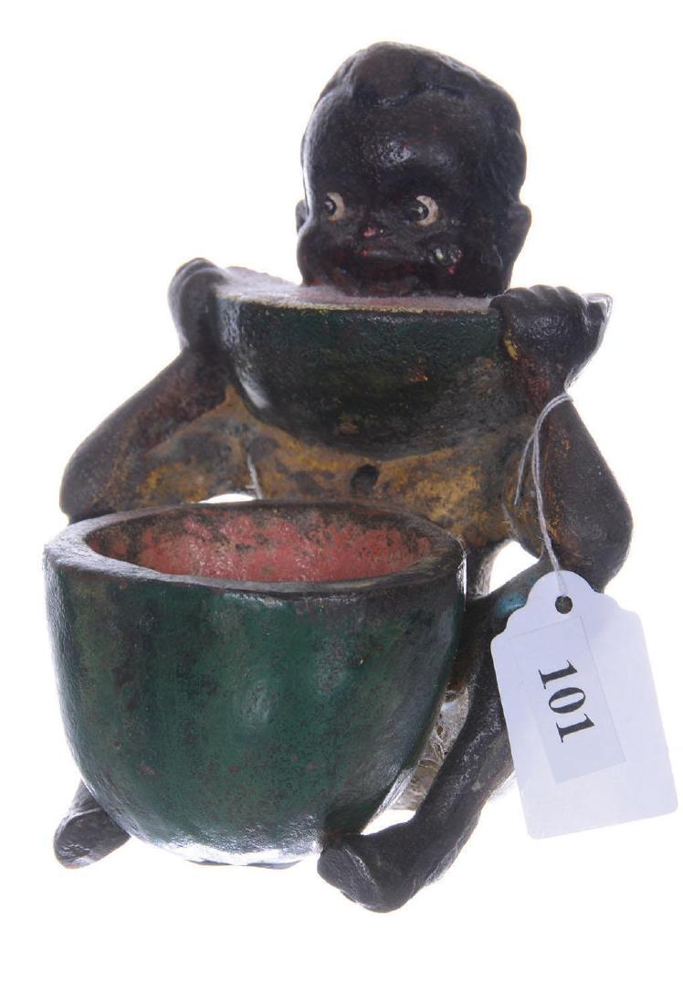 5" CAST IRON FIGURAL MATCH HOLDER: BLACK MEMORABILIA - YOUNG BOY EATING WATERMELON - GOOD PAINT