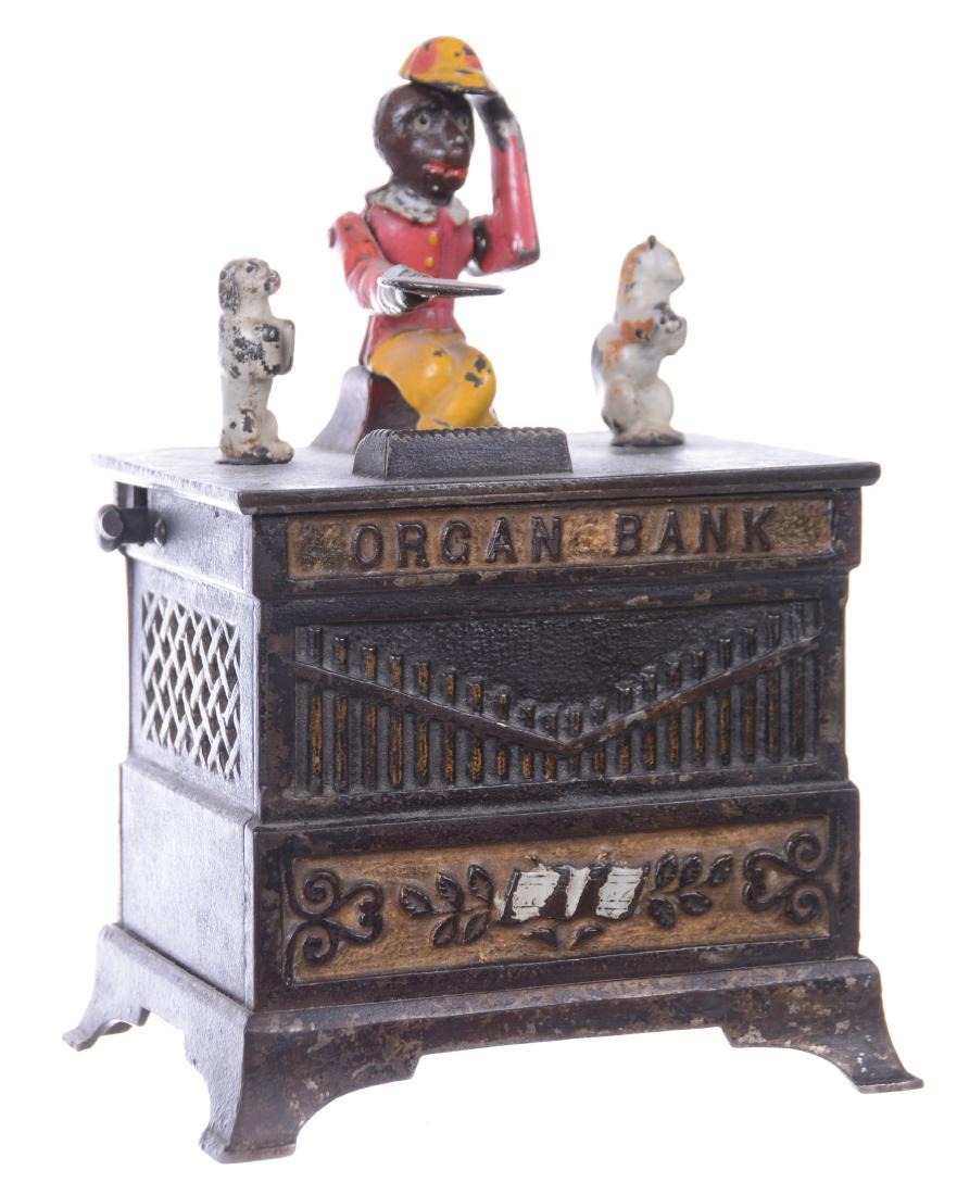 7.5" X 5" CAST IRON MECHANICAL BANK - ORGAN WITH: PATENT DATE 1882 - GOOD WORKING CONDITION - WORKING BELLS - HANDLE MOSTLY MISSING - LOWER DOOR IS MISSING
