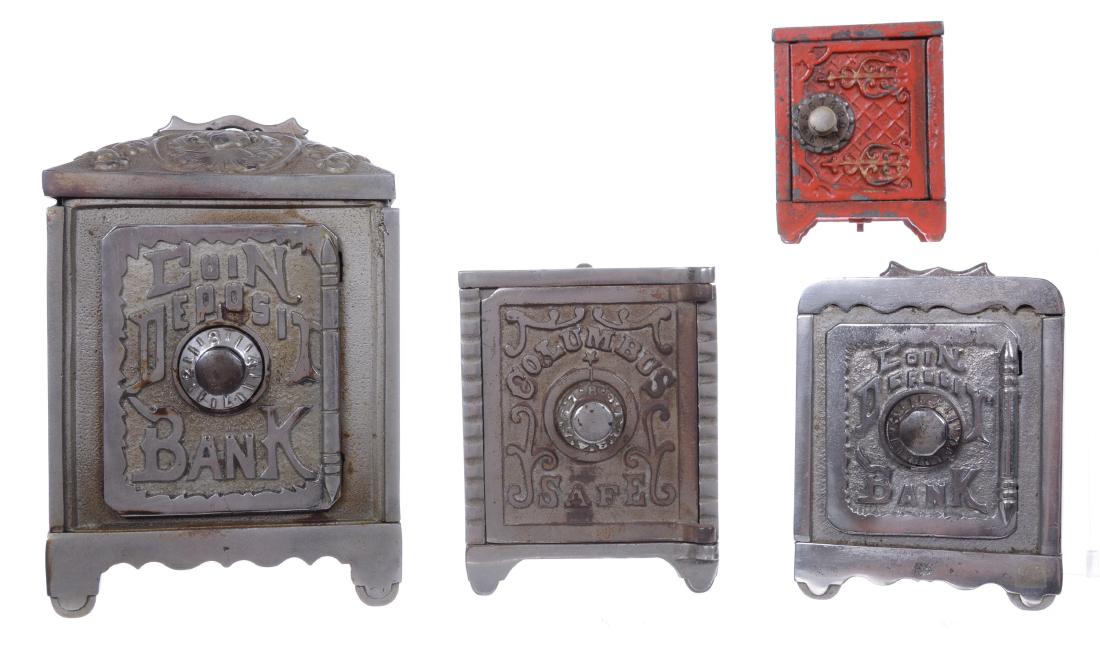 (4) CAST IRON STILL BANKS: DIAL DOOR SAFES - (1) 8" X 5.25" WITH EMBOSSED FLORAL AND FRUIT DESIGN - (1) 5.25" X 4" "COLUMBUS" - (1) 5" X 4" WITH EMBOSSED FLORAL AND FRUIT DECOR - (1) 4" X 4" KENTON BRAND WITH RED PAINT - SEE PH