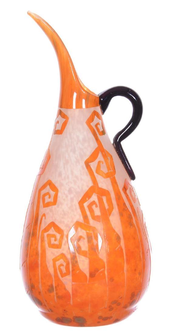 12" SIGNED LEVERRE FRANCAIS FRENCH CAMEO ART GLASS EWER: 12" SIGNED LEVERRE FRANCAIS FRENCH CAMEO ART GLASS EWER MOTTLED WHITE BACKGROUND WITH CAMEO CARVED ORANGE OVERLAY OF ART DECO DESIGN - BLUE APPLIED HANDLE - SIGNED "CHARDER" UNDER HANDLE - BLACK AMETH