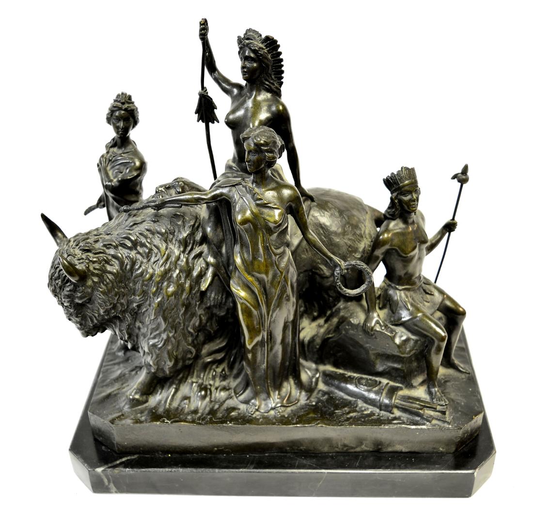 Bronze sculpture: Bronze sculpture of a figural group, depicting 4 warrior women with their weapons, standing with a bison; on a marble base. 13½" wide, 8" deep, 12" tall. Losses noted.