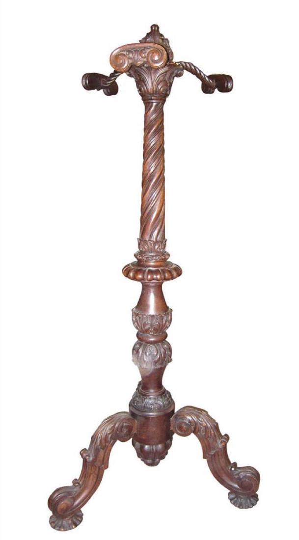 Antique Italian coat rack: Antique Italian coat rack of solid hand carved oak, on foliate carved tripod base. Height: 71".