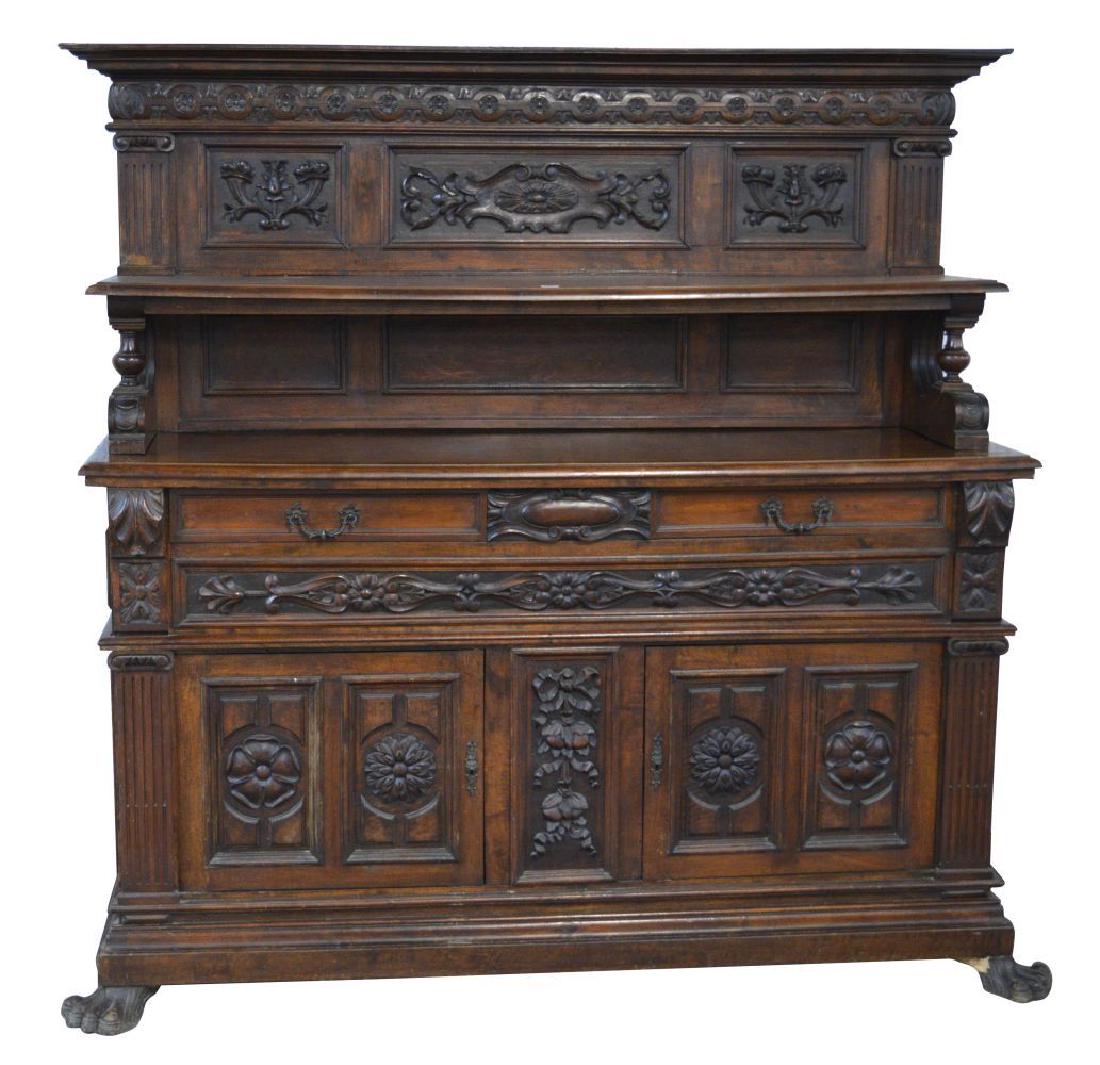 Antique 2-part buffet: Large antique Italian hand-carved 2-part buffet, decorated with floral and foliate motifs; fitted with 2 cupboard doors and 2 drawers. Length: 80". Height: 77". Width: 22".