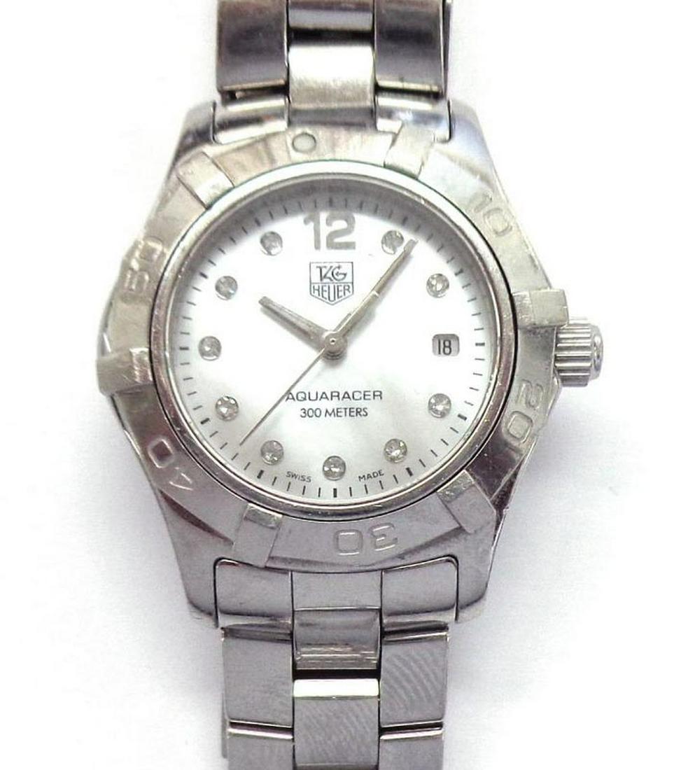 Tag Heuer: Lady's stainless steel Tag Heuer Aquaracer wristwatch and bracelet, Ref. RWT1213, quartz movement, with original case.