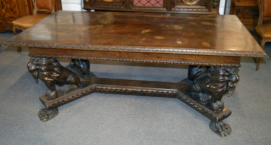 Antique Italian rectangular dining table: Fine antique Italian rectangular dining table, the base with ornately hand-carved lion supports and large paw feet. 75" long, 39" wide, 31" tall.