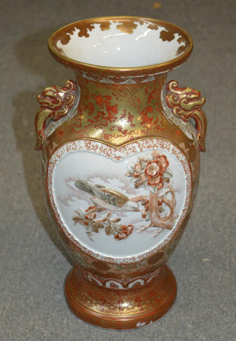 Antique Kutani porcelain vase: Antique Kutani (Jap.) porcelain vase, hand-painted with gilt hightlights depicting figural and floral motifs. Signed underneath. Height: 14".
