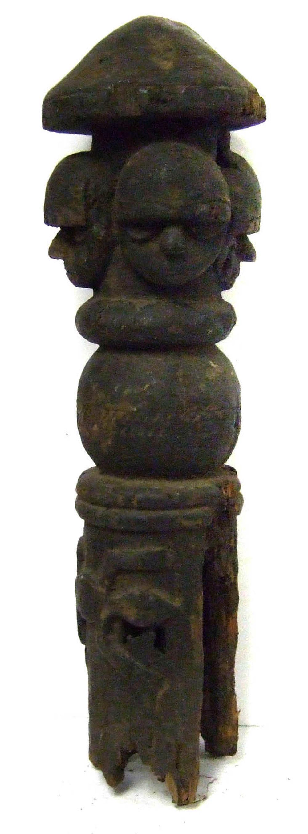 Eket (Nigeria): Eket (Nigeria). Hand-carved wooden post with 4 faces. 24" tall.