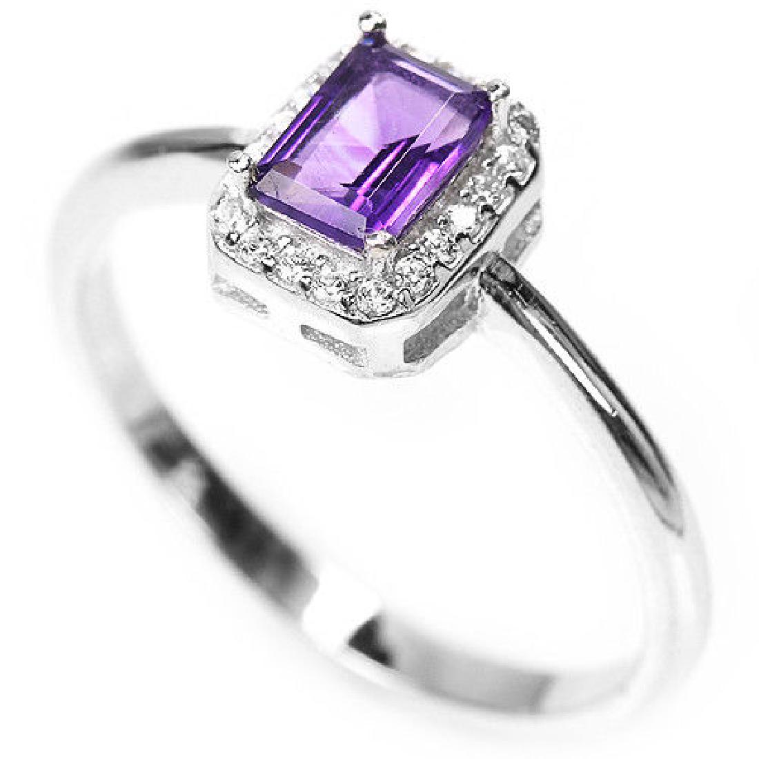 925 Sterling Silver Amethyst & Lab Diamond Ring Size: Stunning sterling silver 925 ring featuring an emerald cut faceted genuine natural purple amethyst gemstone which measures 6mm x 4mm which is surrounded by bright white diamond cut lab created diamond