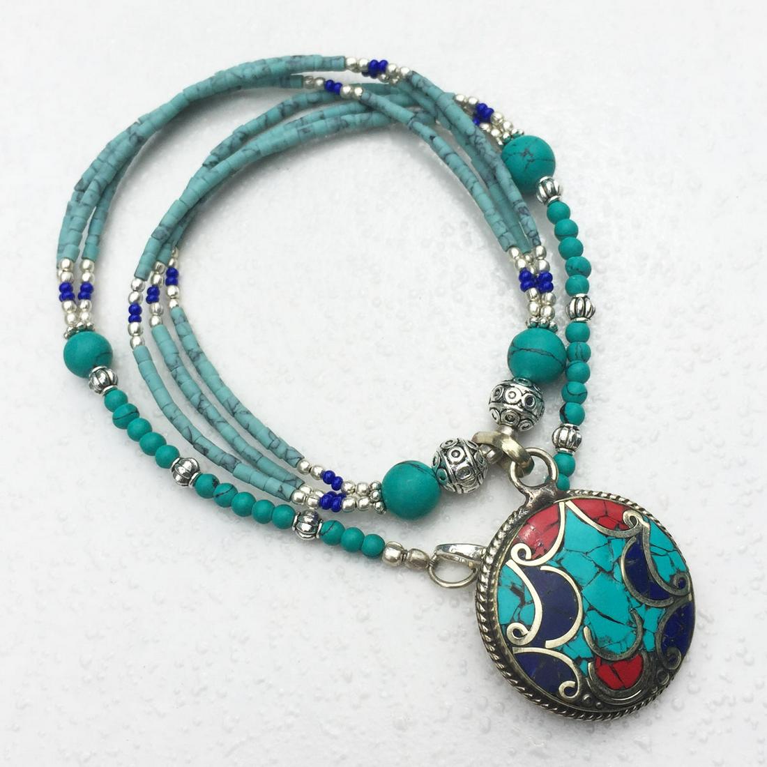 Tibetan Turquoise & Coral Handmade Pendant Necklace: Tibetan Turquoise & Coral Handmade Pendant Necklace Material: Stones Size: 18-20 inch Weight: 35 grams Approx Country/Region of Manufacture: Nepal