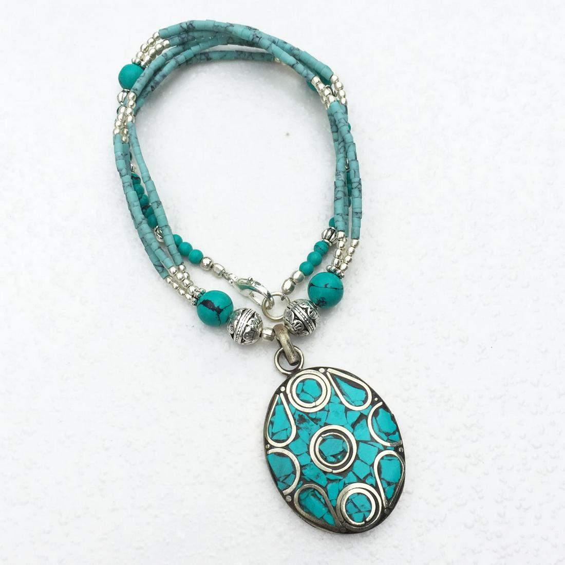 Tibetan Turquoise & Coral Handmade Pendant Necklace: Tibetan Turquoise & Coral Handmade Pendant Necklace Material: Stones Size: 18-20 inch Weight: 35 grams Approx Country/Region of Manufacture: Nepal