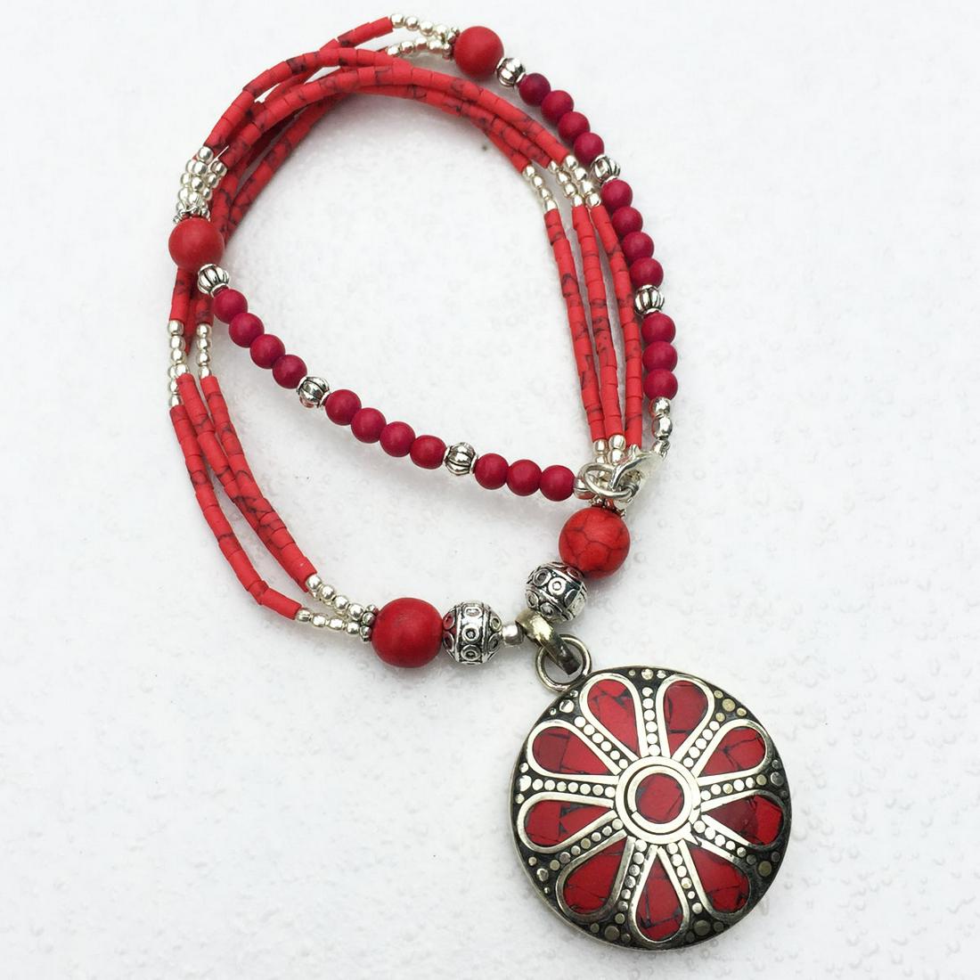 Tibetan Turquoise & Coral Handmade Pendant Necklace: Tibetan Turquoise & Coral Handmade Pendant Necklace Material: Stones Size: 18-20 inch Weight: 35 grams Approx Country/Region of Manufacture: Nepal