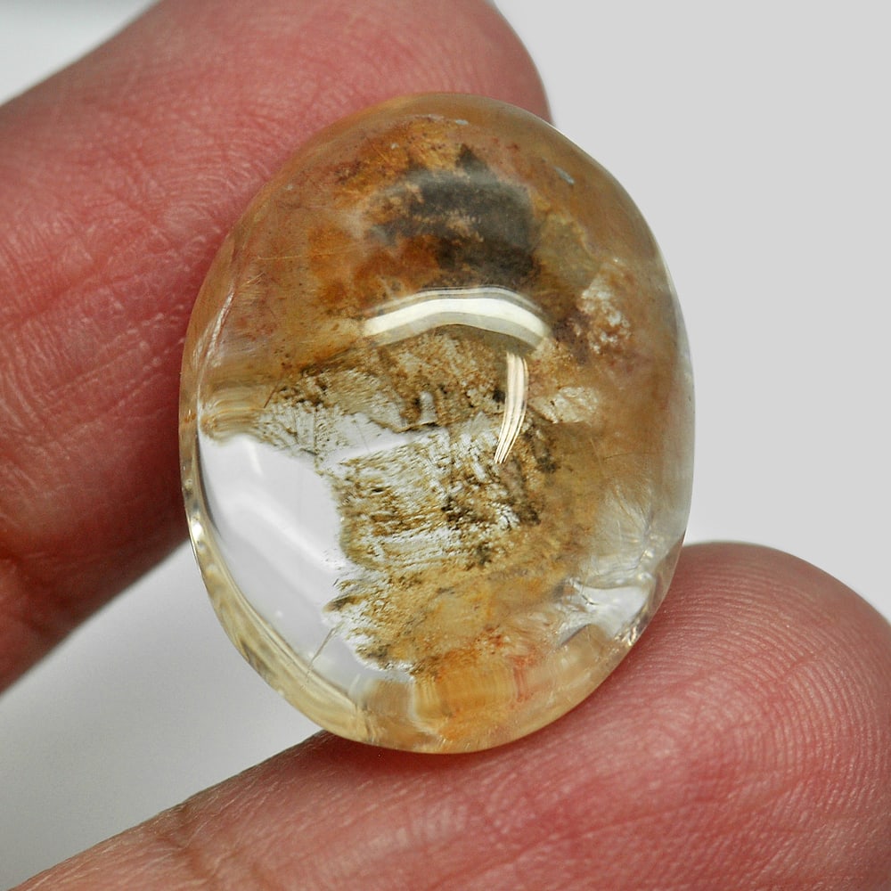 Moss Brown White Quartz 24.83 Ct. Oval Cabochon 22 x 16.8 Mm. Natural Unheated: Gemstone Natural Natural Quartz ProductID 805529310 Weight 24.83 CT. Size 22 x 16.8 x 10.2 Mm. Shape Oval Cabochon Color White Clarity Semi - Transparent Luster Good Origin Thailand Treatment Unheated