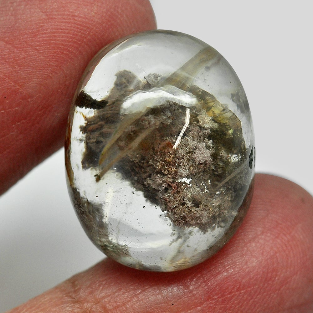 Moss Brown White Quartz 28.95 Ct. Oval Cabochon 27x 17.1 Mm. Natural Unheated: Gemstone Natural Natural Quartz ProductID 805529312 Weight 28.95 CT. Size 22 x 17.1 x 11.1 Mm. Shape Oval Cabochon Color White Clarity Semi - Transparent Luster Good Origin Thailand Treatment Unheated