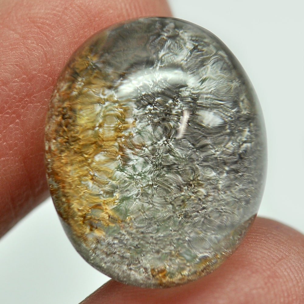 Moss Brown Yellow White Quartz 25.78 Ct. Oval Cabochon 20 x 16 Mm. Natural Gem: Gemstone Natural Natural Quartz ProductID 805529345 Weight 25.78 CT. Size 20 x 16 x 11 Mm. Shape Oval Cabochon Color White Clarity Semi - Transparent Luster Good Origin Thailand Treatment Unheated Har