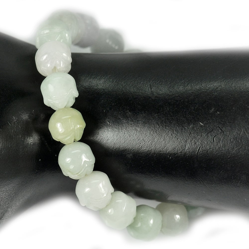 Green Jade 152.71 Ct. Beads Flexibility Bracelet Carving 7 Inch. Natural Gem: Gemstone Natural Natural Jade ProductID 819814176 Weight 152.71 CT. Size Length 7 Inch.10 x 9 Mm. Shape Carving Color Green Clarity Opaque Luster Good Origin Thailand Treatment Unheated Hardness: 6.5
