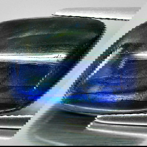 Multi Color Blue Labradorite Doublet 9.47 Ct Baguette Cabochon Shape 16 x 12 x 5.2 Mm. Natural: Product ID: 804301176 Product Name: Natural Labradorite Weight: 9.47 CT. Size: 16 x 12 x 5.2 MM. Shape: Baguette Cabochon Color: Multi-Color Clarity:Opaque Luster: Iridescent Gems Origin: Canada Treat