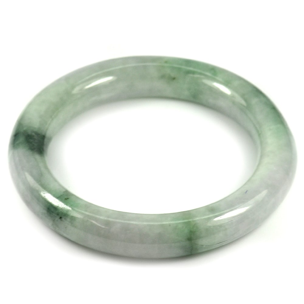 Multi-Color Jade Bangle Diameter 52 Mm. 284.37 Ct. Natural Gemstone Unheated: Product ID: 819815153 Product Name: Natural Jade Weight: 284.37 CT. Size: 73 x 52 x 11 MM. Shape: Round Cabochon Color: Multi-Color Clarity:Opaque Luster: Good Gems Origin: Thailand Treatment: Unheate