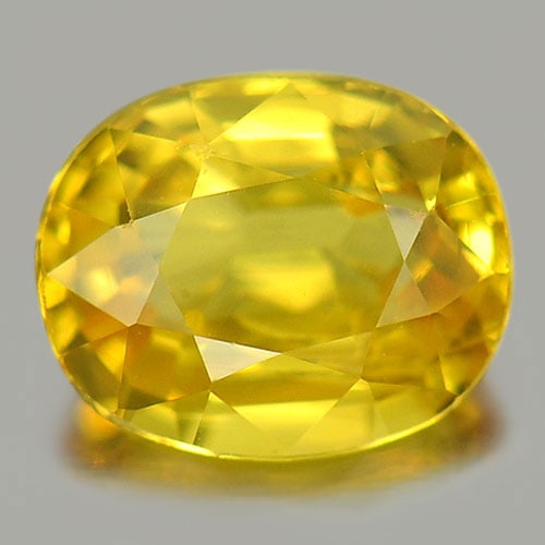 Yellow Sapphire 1.10 Ct. VS Oval Shape 6.7 x 5.4 Mm. Natural Gemstone From Thailand: Product ID: 806151847 / Product Name: Natural Yellow Sapphire / Weight: 1.10 CT. / Size: 6.7 x 5.4 x 3.4 MM. / Shape: Oval / Color: Yellow / Clarity:VS / Luster: Very Good / Gems Origin: Thailand / Tr
