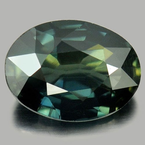 Bluish Green Sapphire 1.18 Ct. Clean Oval Shape 7.5 x 5.6 Mm. Natural Gemstone From Thailand: Product ID: 806148465 / Product Name: Natural Green Sapphire / Weight: 1.18 CT. / Size: 7.5 x 5.6 x 3.4 MM. / Shape: Oval / Color: Bluish Green / Clarity:IF / Luster: Good / Gems Origin: Thailand / Tr