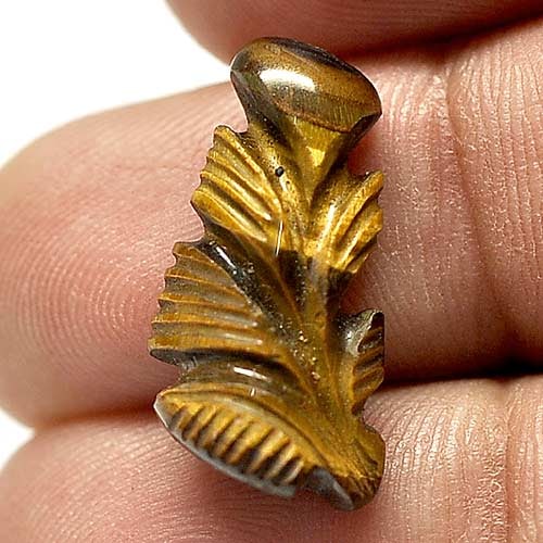 Golden Tiger Eye 8.35 Ct. Carving Leaves 22 x 11 Mm. Natural Gemstone Thailand: Product ID: 811600086 / Product Name: Natural Tiger eye / Weight: 8.35 CT. / Size: 22 x 11 x 6 MM. / Shape: Carving Leaves / Color: Golden / Clarity:Opaque / Luster: Good / Gems Origin: Thailand / Tre