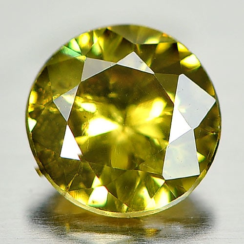 Greenish Yellow Demantoid Garnet 0.63 Ct. Round Shape 5.4 Mm. Natural Gemstone Unheated: Product ID: 802931642 / Product Name: Natural Demantoid / Weight: 0.63 CT. / Size: 5.4 x 5.4 x 3.1 MM. / Shape: Round / Color: Greenish Yellow / Clarity:SI1 / Luster: Very Good / Gems Origin: Madagasc