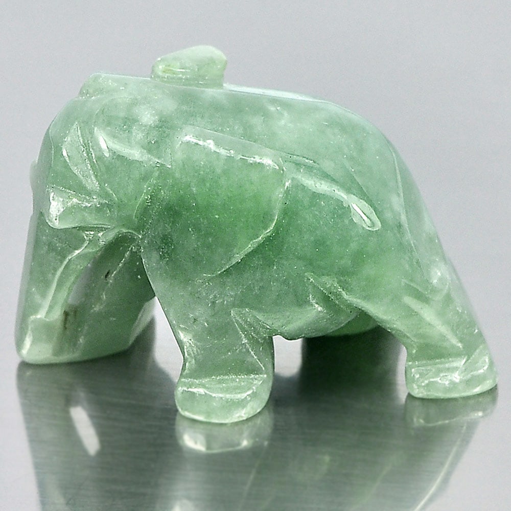 Green Jade 74.15 Ct. Elephant Carving 30 x 20 Mm. Natural Gemstone Unheated: Product ID: 819812718 / Product Name: Natural Jade / Weight: 74.15 CT. / Size: 30 x 20 x 18 MM. / Shape: Elephant Carving / Color: Green / Clarity:Opaque / Luster: Good / Gems Origin: Thailand / Treat