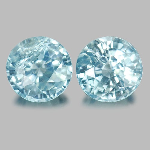 Blue Zircon 2.79 Ct. 2 Pcs. Round Shape 6.2 Mm. Natural Gemstones From Cambodia: Product ID: 807717115 / Product Name: Natural Zircon / Weight: 2.79 CT. / Size: 6.2x4,6.2x3.7 MM. / Shape: Round / Color: Blue / Clarity:SI1 / Luster: Good / Gems Origin: Cambodia / Treatment: Heated 