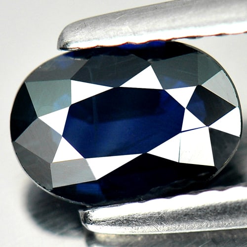 Certified Blue Sapphire 0.93 Ct. Oval Shape 7.27 x 5.15 Mm. Natural Gemstone From Thailand: Product ID: 806005596 Product Name: Natural Blue Sapphire Weight: 0.93 CT. Size: 7.27 x 5.15 x 2.50 MM. Shape: Oval Color: Blue Clarity:SI Luster: Good Gems Origin: Thailand Treatment: Heated Crystal 