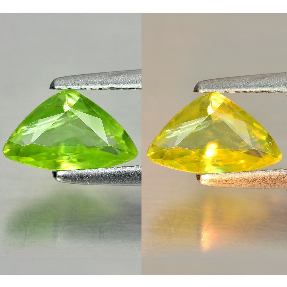 Green Titanium Sphene With Rainbow Spark 1.15 Ct. Fancy Shape 9.6 x 6 Mm Natural Gemstone: Product ID: 806507843 Product Name: Natural Sphene Weight: 1.15 CT. Size: 9.6 x 6 x 3 MM. Shape: Fancy Color: Green With Rainbow Spark Clarity:SI1 Luster: Adamantine Gems Origin: Madagascar Treatment: