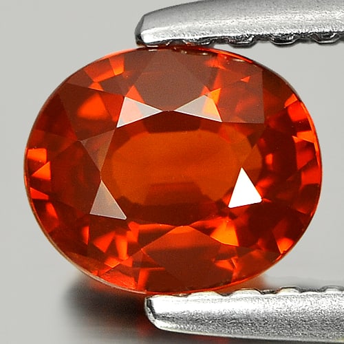 Reddish Orange Spessartine Garnet 0.73 Ct. Oval Shape 6.1 x 5 Mm. Natural Gemstone From Nigeria: Product ID: 802918673 Product Name: Natural Spessartine Weight: 0.73 CT. Size: 6.1 x 5 x 2.7 MM. Shape: Oval Color: Reddish Orange Clarity:VSI Luster: Good Gems Origin: Nigeria Treatment: Unheated Cry
