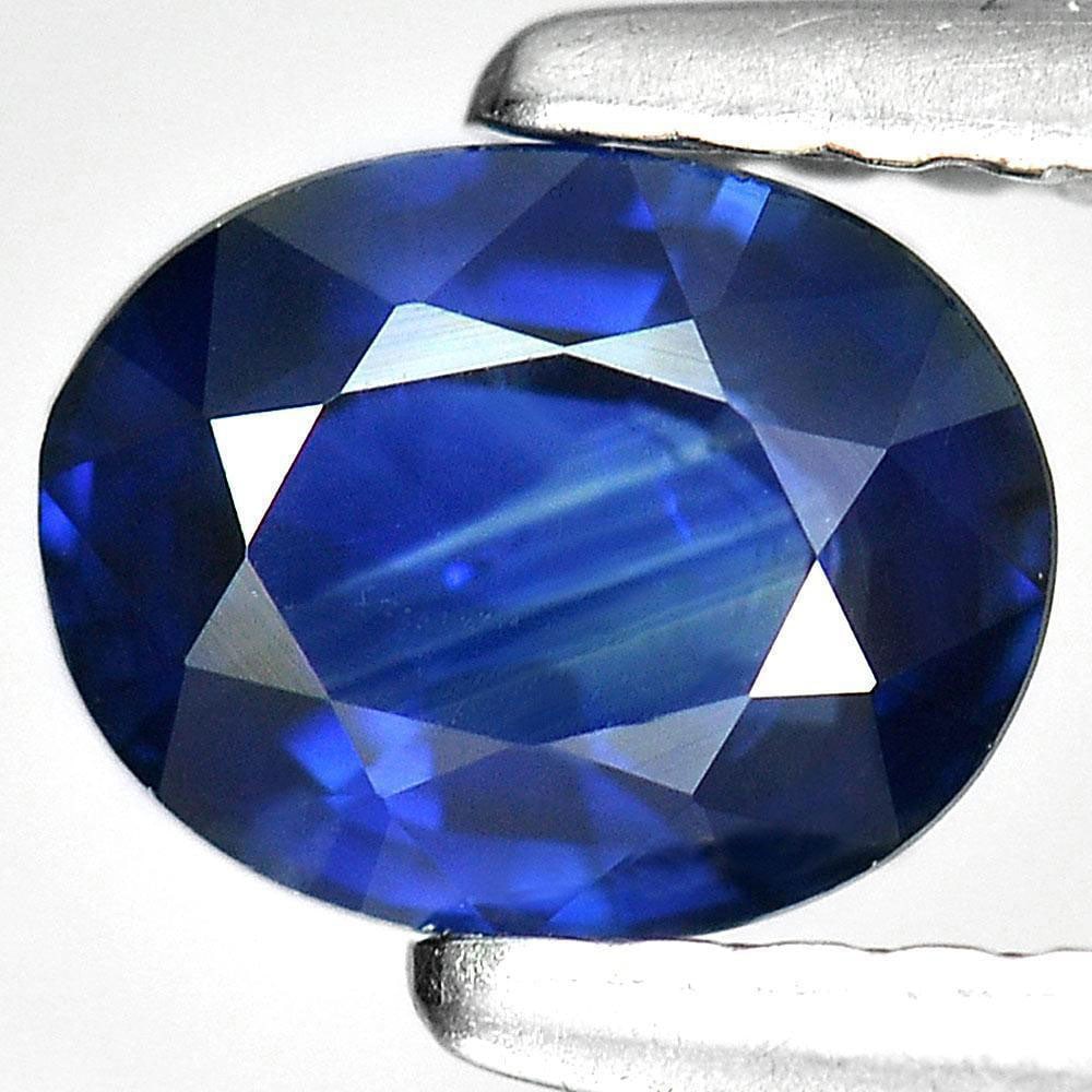 Blue Sapphire 0.85 Ct. Oval Shape 6.4 x 5 Mm. Natural Gemstone From Thailand: Product ID: 806008901 Product Name: Natural Blue Sapphire Weight: 0.85 CT. Size: 6.4 x 5 x 2.9 MM. Shape: Oval Color: Blue Clarity:VS Luster: Good Gems Origin: Thailand Treatment: Heated Crystal Struc