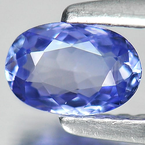 Violetish Blue Tanzanite 0.49 Ct. Oval Shape 6 x 4.1 Mm. Natural Gemstone From Tanzania: Product ID: 807007515 Product Name: Natural Tanzanite Weight: 0.49 CT. Size: 6 x 4.1 x 2.6 MM. Shape: Oval Color: Violetish Blue Clarity:VSI Luster: Good Gems Origin: Tanzania Treatment: Heated Crysta