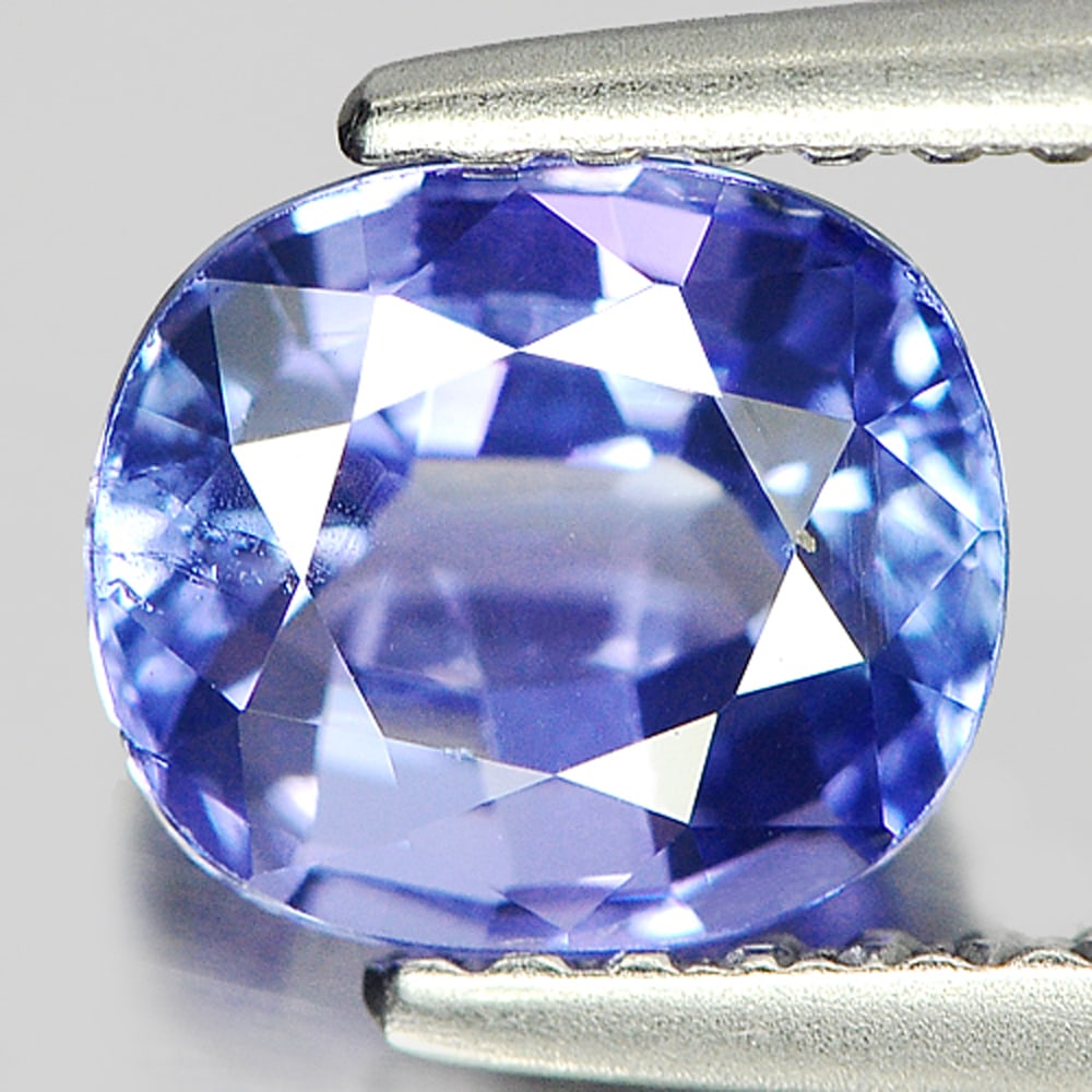 Violetish Blue Tanzanite 1.50 Ct. Cushion Shape 6.8 x 6 Mm. Natural Gemstone From Tanzania: Product ID: 807009171 Product Name: Natural Tanzanite Weight: 1.50 CT. Size: 6.8 x 6 x 4.4 MM. Shape: Cushion Color: Violetish Blue Clarity:SI Luster: Very Good Gems Origin: Tanzania Treatment: Heated