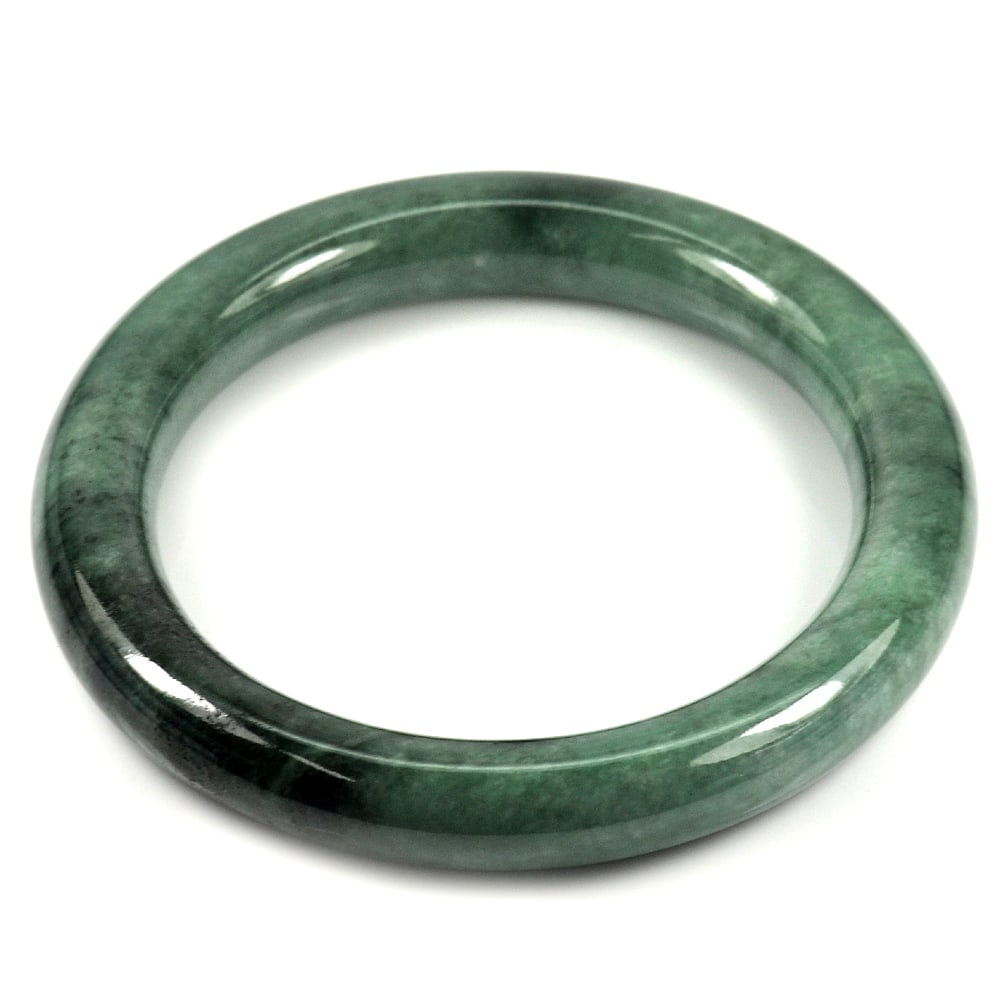 Green Jade Bangle Diameter 55 Mm. 289.53 Ct. Natural Gemstone Unheated: Product ID: 819815219 Product Name: Natural Jade Weight: 289.53 CT. Size: 75 x 55 x 10 MM. Shape: Round Cabochon Color: Green Clarity:Opaque Luster: Good Gems Origin: Thailand Treatment: Unheated Crys