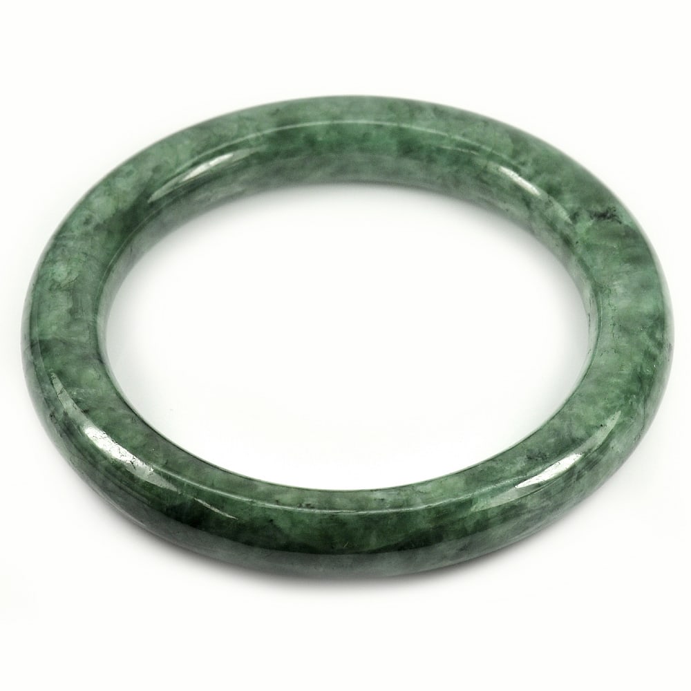 Green Jade Bangle Diameter 55 Mm. 275.12 Ct. Natural Gemstone Unheated: Product ID: 819815174 Product Name: Natural Jade Weight: 275.12 CT. Size: 75 x 55 x 9 MM. Shape: Round Cabochon Color: Green Clarity:Opaque Luster: Good Gems Origin: Thailand Treatment: Unheated Cryst