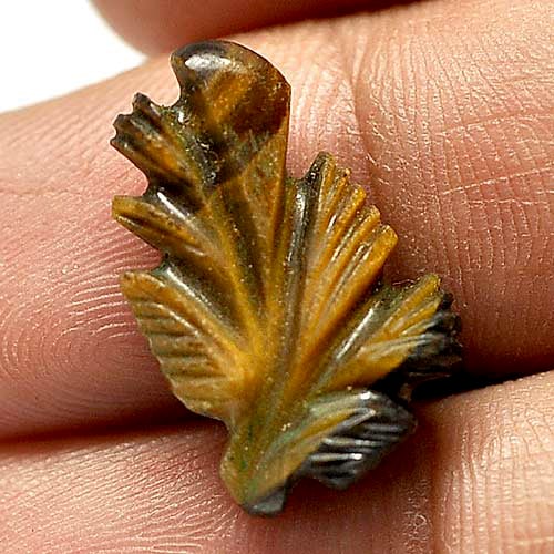 Natural Yellow Golden Tiger Eye 9.02 Ct. Lovely Carving Leaves: Product ID: 811600062 Product Name: Natural Tiger eye Weight: 9.02 CT. Size: 20.7 x 12.8 x 6 MM. Shape: Carving Leaves Color: Yellow Clarity:Opaque Luster: Good Gems Origin: Thailand Treatment: Unheat