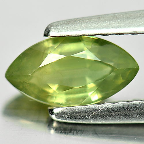 Yellowish Green Sapphire 0.79 Ct. Marquise Shape 7.9 x 4.2 Mm. Natural Gemstone From Thailand: Product ID: 806153359 Product Name: Natural Green Sapphire Weight: 0.79 CT. Size: 7.9 x 4.2 x 2.8 MM. Shape: Marquise Color: Yellowish Green Clarity:VSI Luster: Good Gems Origin: Thailand Treatment: H